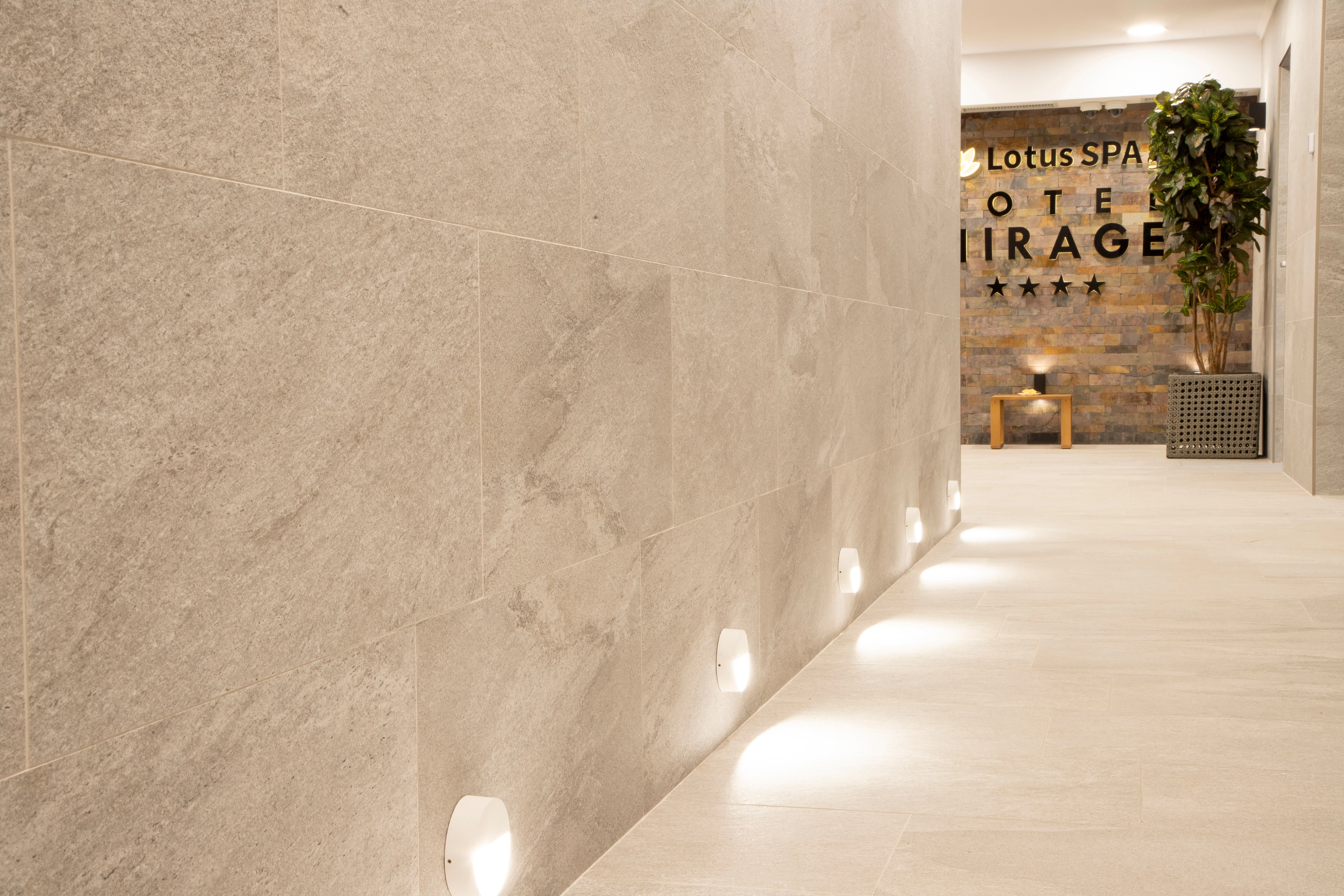 Lure Materialism Endure Decisive elegance inspired by stone and contemporary architecture comes to  life inside the Mirage Resort Hotel thanks to Atlas Concorde porcelain  tiles.